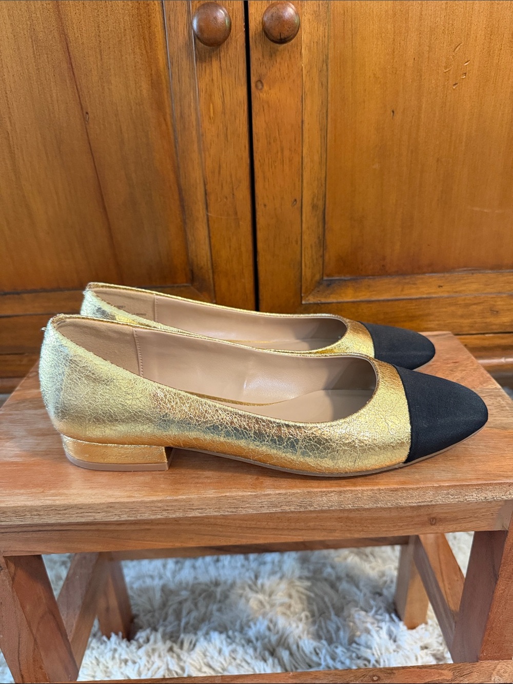 Steve Madden Gold Flats with Black Cap Toe